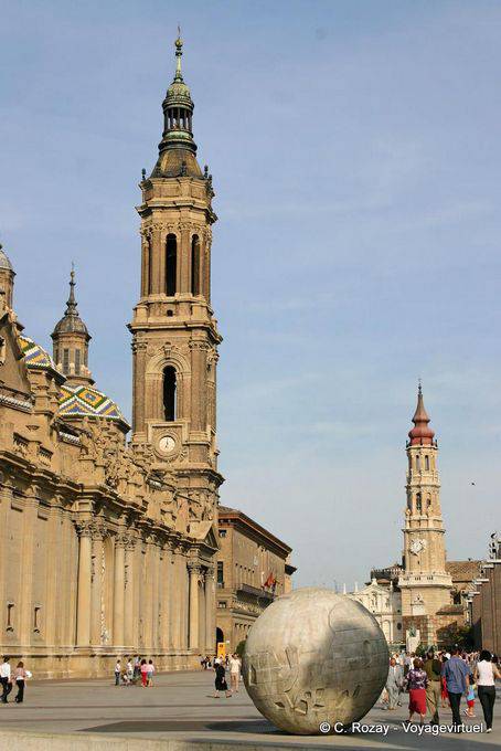 Globe stone in front of the towers of NS del Pilar and Seo, Plaza del Pilar, Zaragoza - Spain
