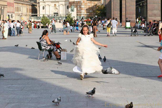 Communion pursuing pigeons, Plaza del Pilar, Zaragoza - Spain