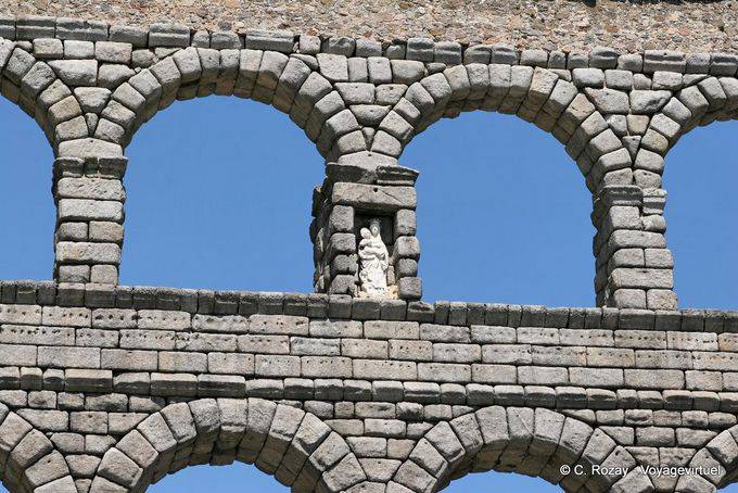 Aqueduct, Virgin between blocks of granite, Segovia - Spain