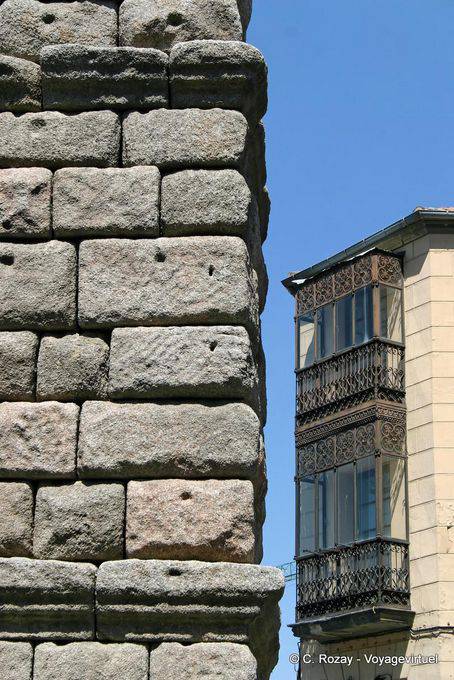 Assembly of granite blocks and balconies typical closed Segovia - Spain
