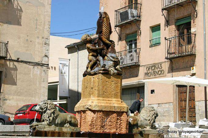 Lion fountain, with children holding a fish, Plaza San Martin, Segovia - Spain