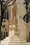 Wells and statuary in the center of Cloister bajo, Burgos Cathedral, Spain.