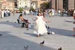 Communion pursuing pigeons, Plaza del Pilar, Zaragoza, Spain.
