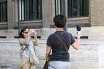 Japanese souvenir photo with pigeon, Zaragoza, Spain.
