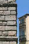 Assembly of granite blocks and balconies typical closed Segovia, Spain.