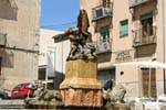 Lion fountain, with children holding a fish, Plaza San Martin, Segovia, Spain.