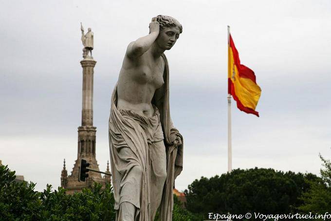 Statue in front of the Columbus Monument, Plaza Colon, Madrid - Spain