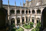 Inside cloister garden view from the first floor, Monastery of St. John of the Kings, Toledo, Spain.
