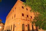 Night view of San Agustin Plaza building, Toledo, Spain.