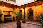 Lit interior patio in Toledo, Spain.