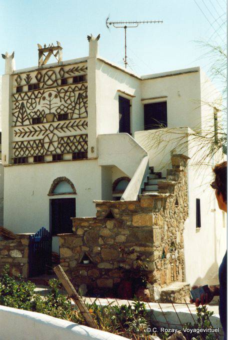 Decorating a typical Cycladic pigeon, Tinos - Greece