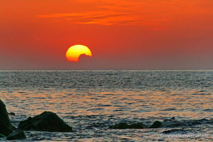 Milos, Pollonia, clouds and sea at sunset - Greece