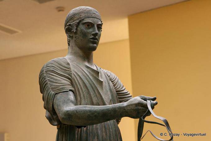 Charioteer holding the reins, Archaeological Museum of Delphi - Greece