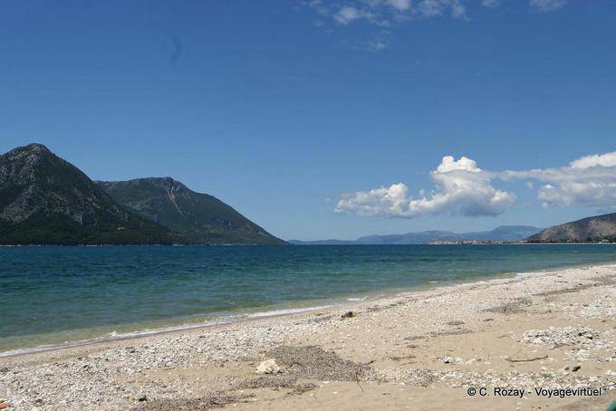 Beach in front of the island of Kalamos, Mitikas - Greece