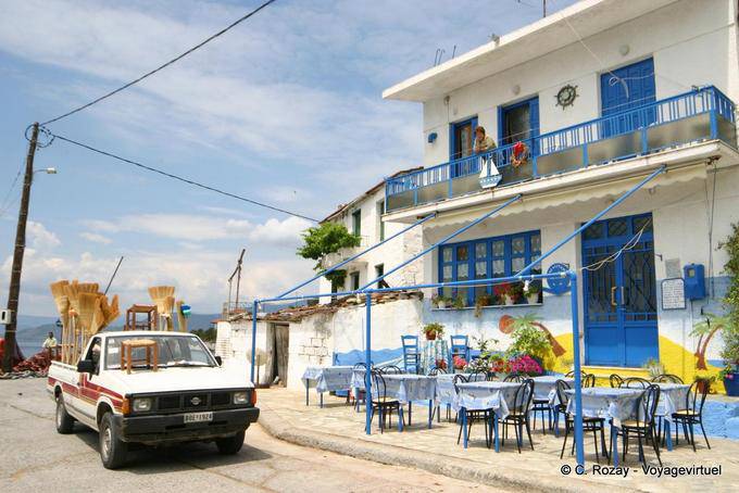 Terrace and broom-seller, Agia Kyriaki - Greece