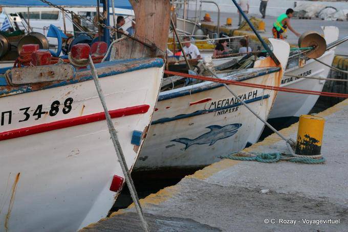 Boat bows in the port of Sounion - Greece