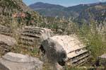 Fluted columns and landscape, Delphi, Greece.
