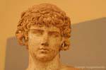 Head of the statue of Antinous, Delphi Museum, Greece.