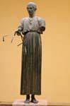 Statue of the Charioteer of face, Archaeological Museum of Delphi, Greece.