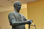 Charioteer holding the reins, Archaeological Museum of Delphi, Greece.