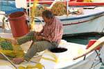 Mending nets, Ancient Epidavros, Greece.