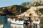 Boats in the small port of Sampatiki, Greece.