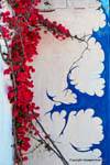 Milos, Plaka, mural painting and bougainvillea, Greece.