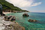 Mountains plunging into the sea, Milopotamos Pelion, Greece.