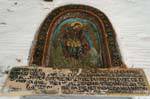 Angel and painted inscription on the church, Milies, Pelion, Greece.