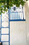 Wall, gate and staircase in Agia Kyriaki, Greece.