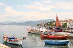 Colourful boats from the port, Trikeri, Agia Kyriaki, Greece.