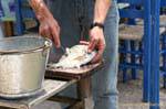 Preparation of fish, Trikeri, Agia Kyriaki, Greece.