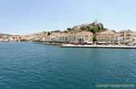 The docks arriving by boat, Poros, Greece.