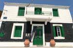 Black and green house, Poros, Greece.
