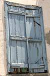 The dilapidated window shutters, Poros, Greece.