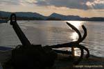 Anchor Bay and solar reflection, Poros, Greece.