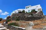 Sifnos, Kastro, perched home and dry stone wall, Greece.
