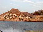Harbor entrance view from the sea, Hydra, Greece.