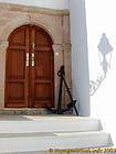 Anchor and door Hydra, Greece.