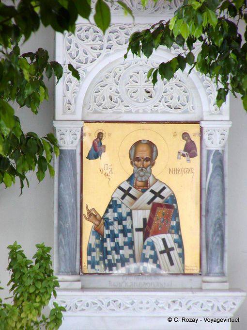 Icon and the marble cathedral Agios Nikolaos, Spetses - Greece