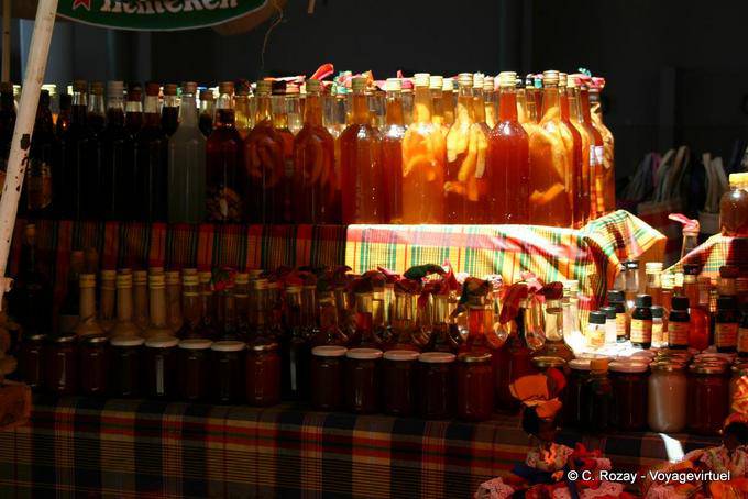 Stall of local products, with rums of all kinds, covered market, Basse-Terre - Guadeloupe