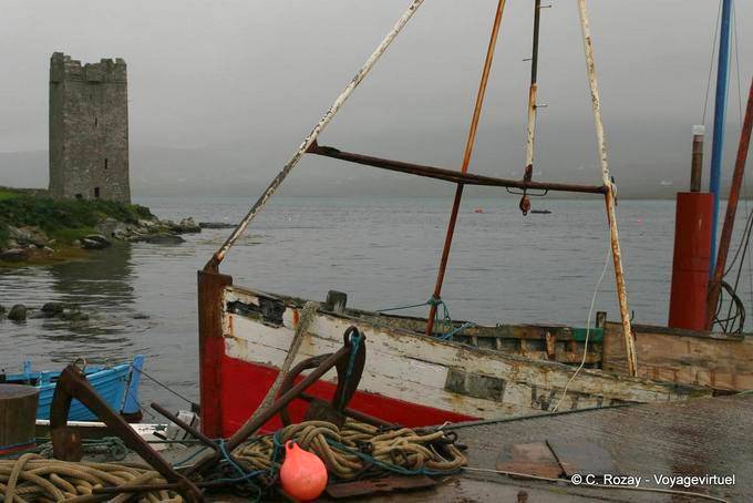 Boat before the Granuaile's Tower, Kildavnet, Achill Island - Ireland