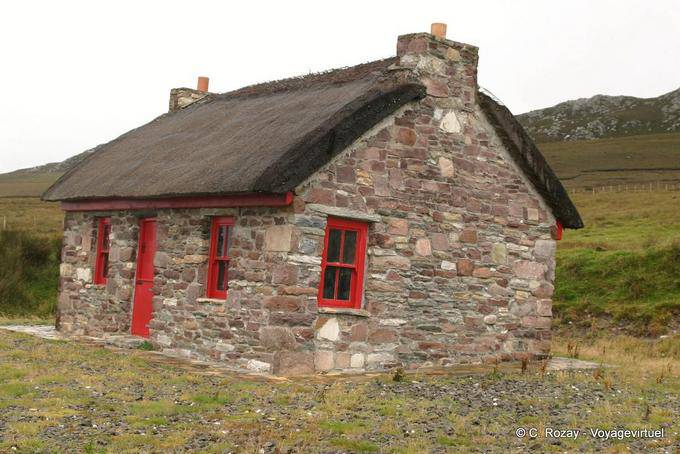 Stone house typical thatched roof, Achill Island - Ireland