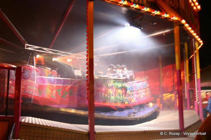 Caterpillar in action, funfair, Dingle - Ireland