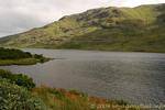 On the shores of one of countless lakes of Connemara, Ireland.