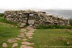 Remains of a dry stone hut (Clochán), Fahan, Dingle, Ireland.