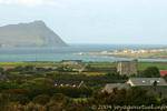 Gallarus Castle, and Carrigbrean Murreagh Bay, Dingle, Ireland.