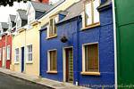 Colored houses on a street in Dingle, Ireland.