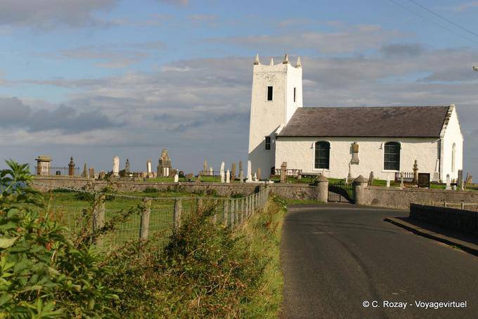 Church steeple in funny to Ballinton Harbour, Antrim Coast - Nothern Ireland