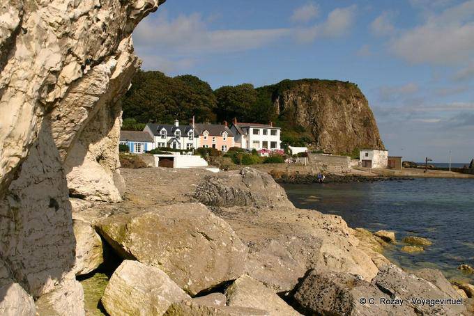 Houses between the cliffs of Port Braddan, White Park Bay - Nothern Ireland